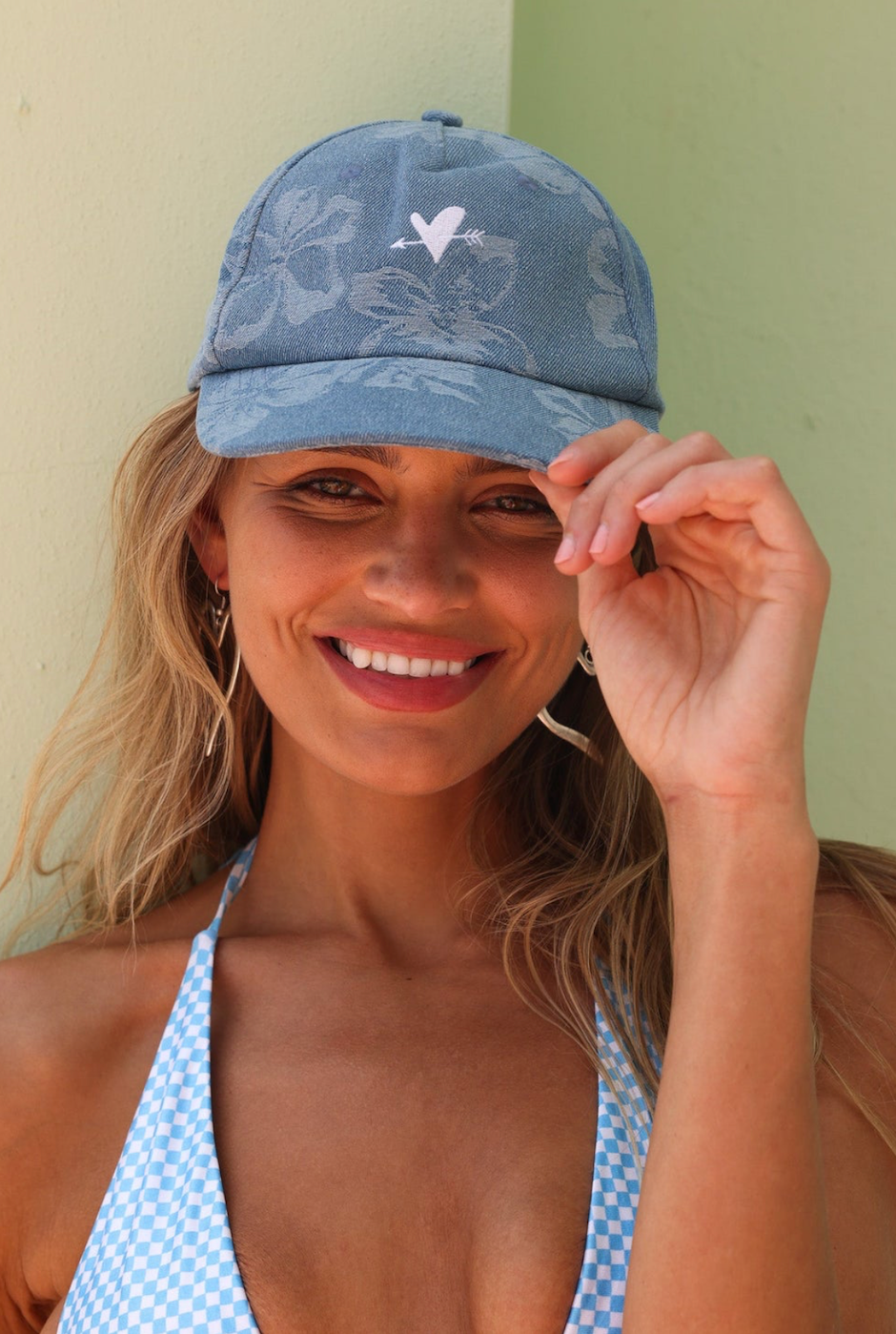 Close-up detail of embroidery and denim fabric of Kulani Kinis hat