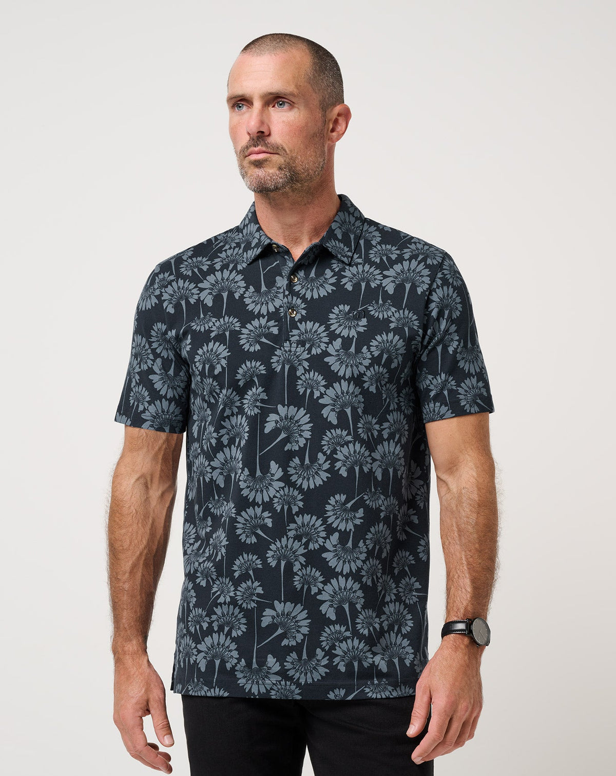 TravisMathew Comfortknit Breeze Polo in Total Eclipse men's floral golf polo front view
