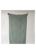 Pokoloko Leaf Appliqué Turkish cotton towel in teal and natural with botanical jacquard pattern