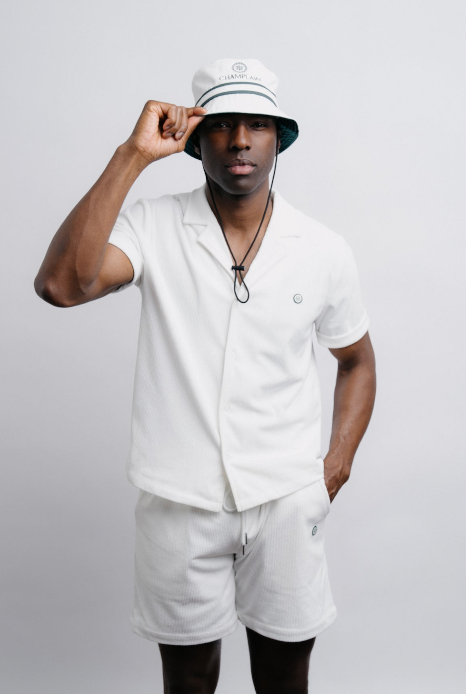 Champlain Corduroy Shorts in white, featuring textured corduroy fabric, clean silhouette, and premium craftsmanship. Perfect for pairing with the Camp Collar Pinstripe shirt for a complete Vancouver-inspired look.