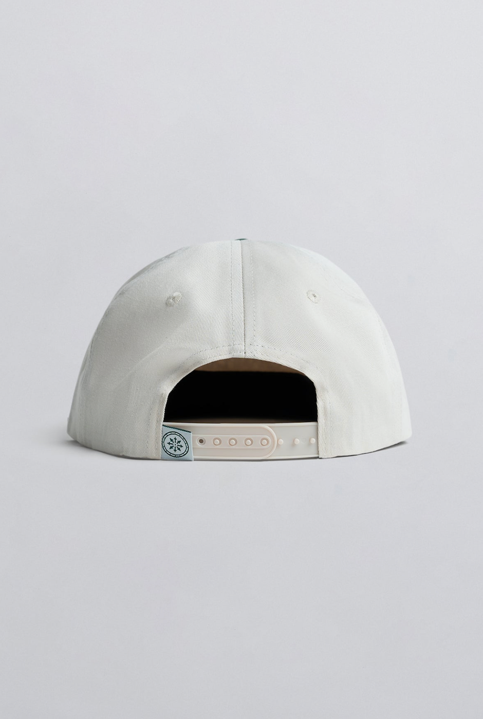 Champlain Cream on Green Hat featuring 5-panel design with contrasting green embroidery -  showing adjustable snapback closure.