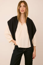 Gentle Fawn Everly Scarf in Navy draped over the shoulders