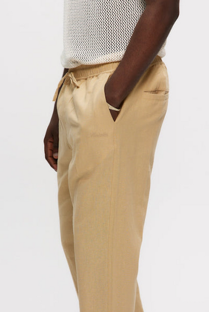 Pantalón de lino Kuwalla Tee beige