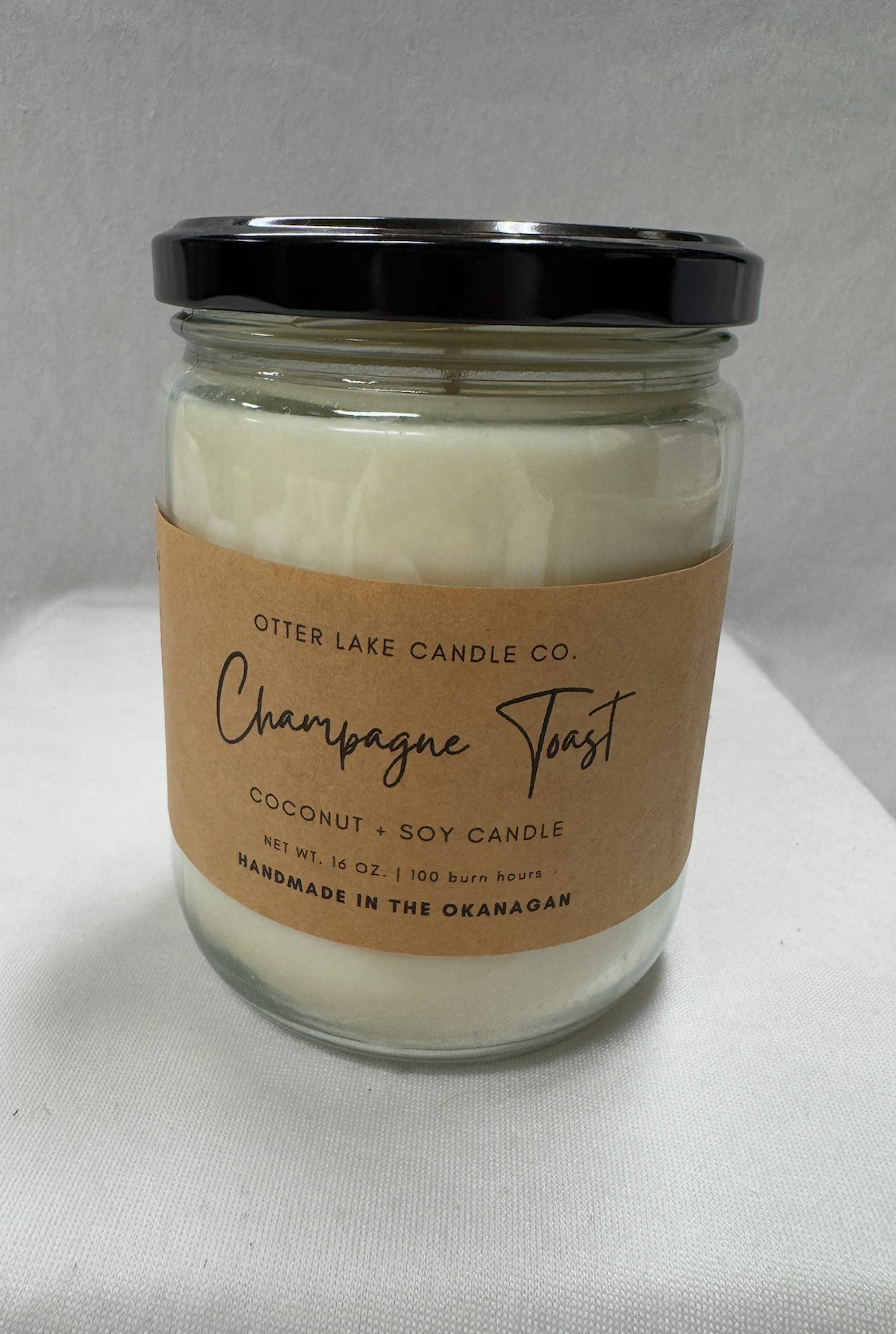 OTTER LAKE CHAMPAGNE TOAST 16 OZ CANDLE