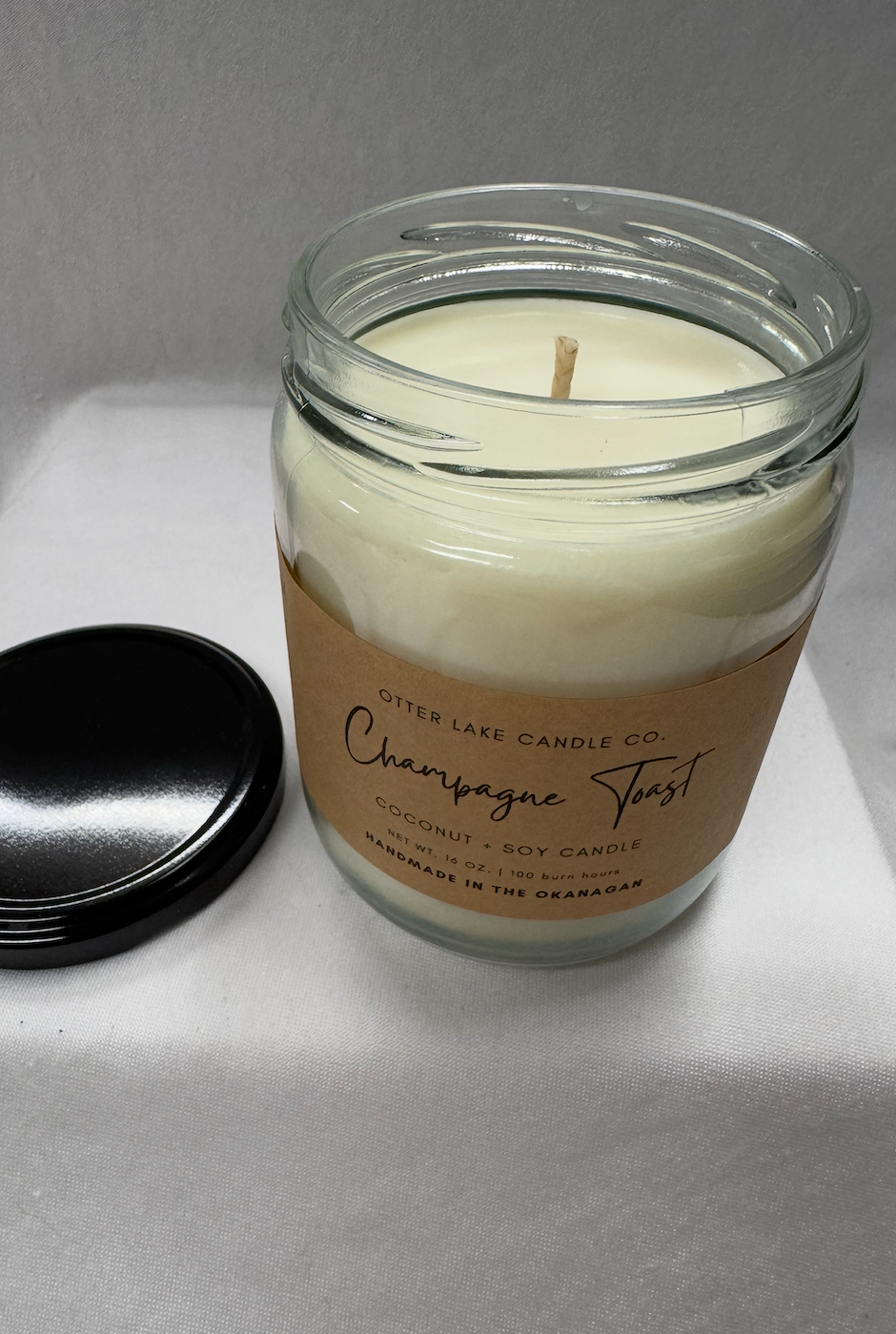 OTTER LAKE CHAMPAGNE TOAST 16 OZ CANDLE