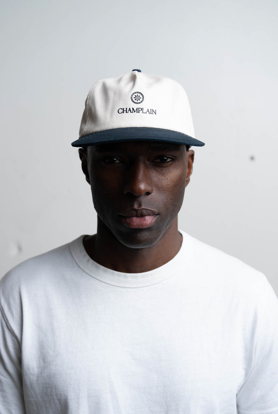 CHAMPLAIN CREAM ON NAVY HAT - ONE SIZE