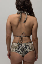 Akua Swim Halter Bikini Top in Wild animal print, back view showing neck and back ties