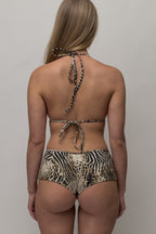 Akua Swim Mini Triangle Bikini Top in Wild animal print, back view showing tie closures