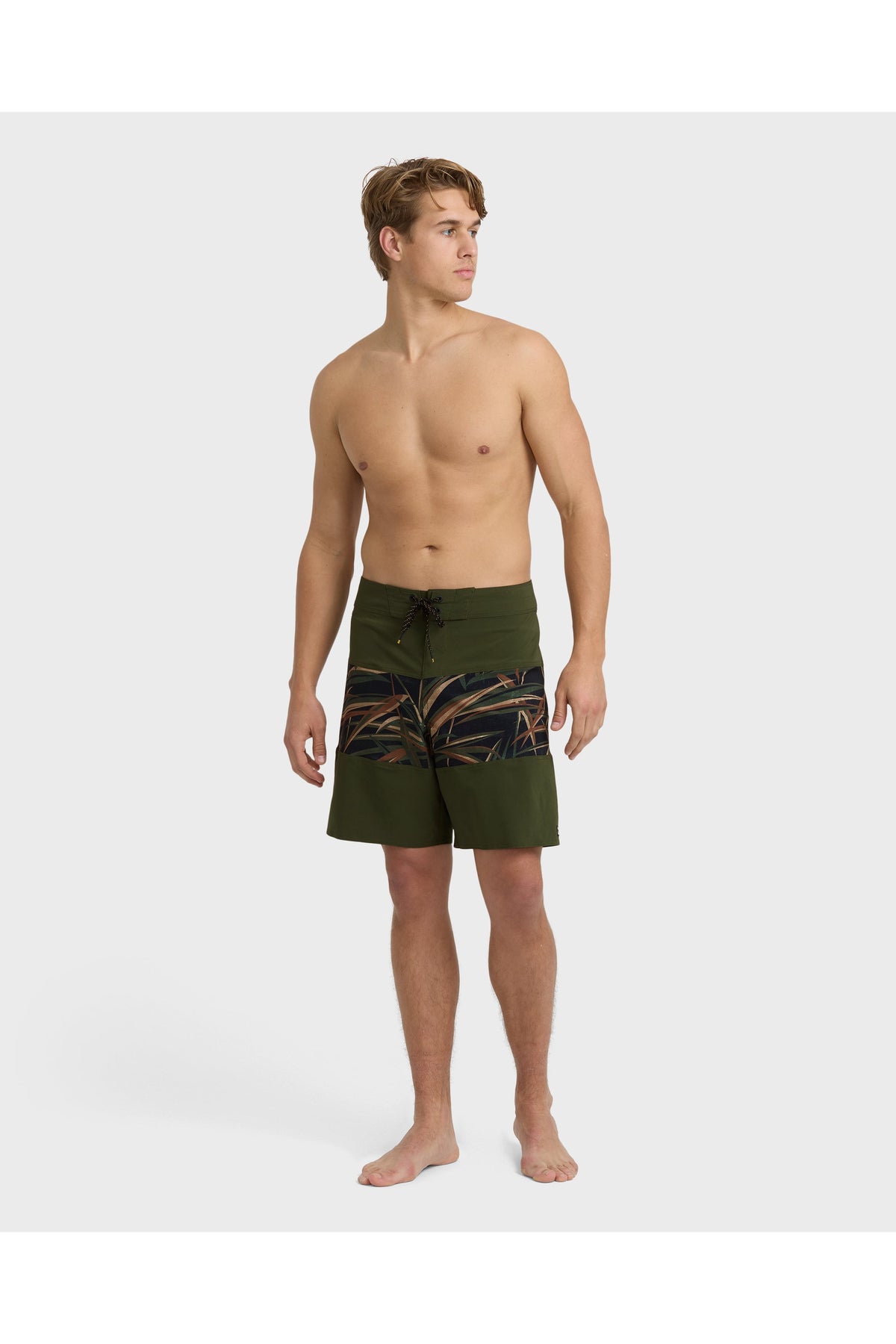 Billabong Tribong Pro 19" Boardshorts in Dark Military, full-length model view