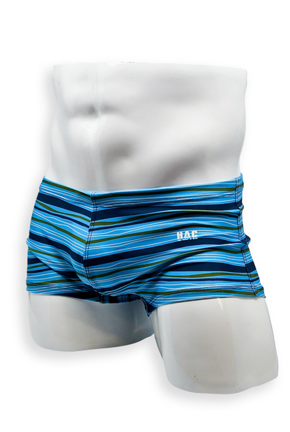 Front view of HAC Swim Box Cut Swim Trunk in blue and white Tidal Stripe print