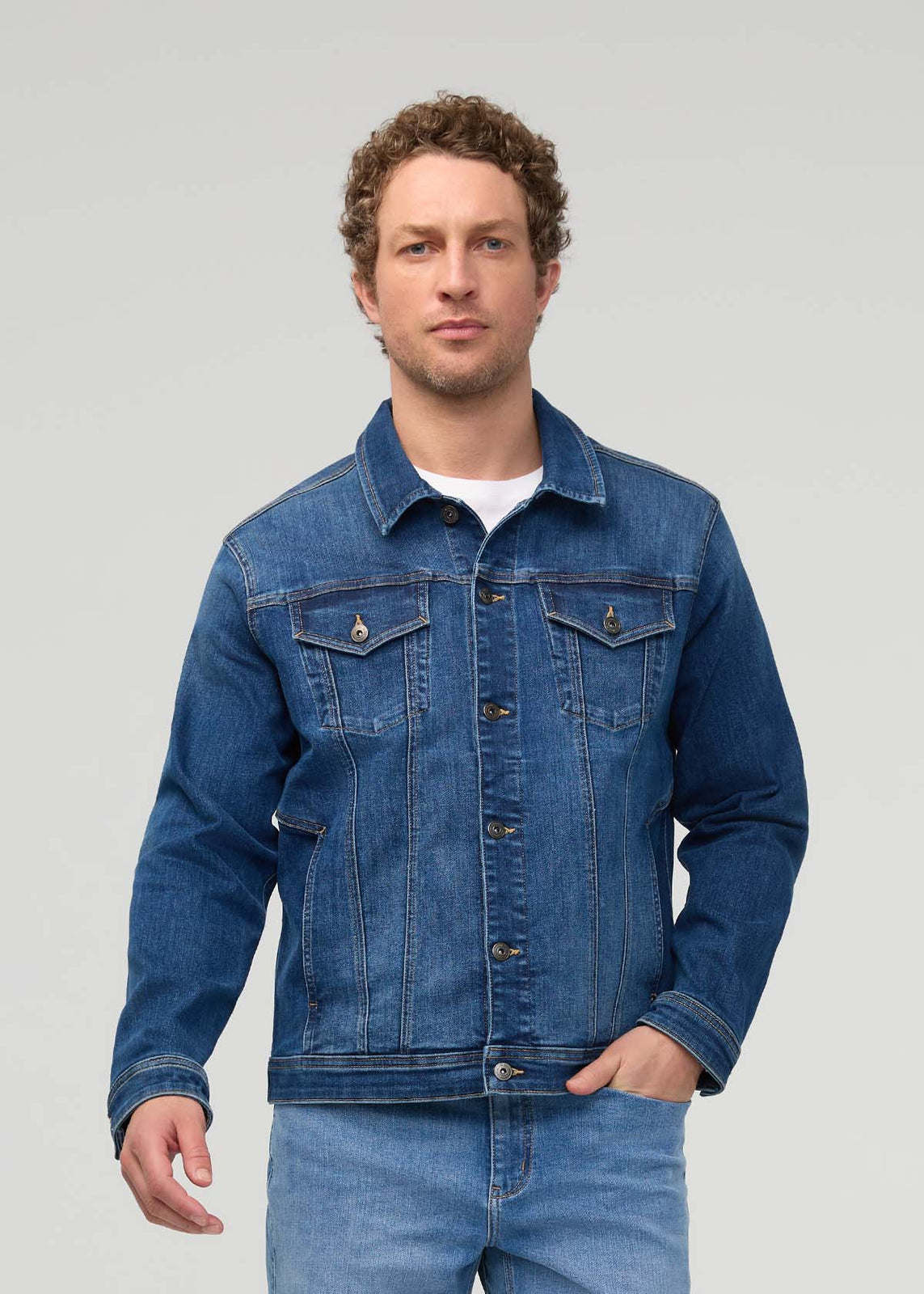 DUER Performance Denim+ All Season Trucker Jacket in Alpine Indigo