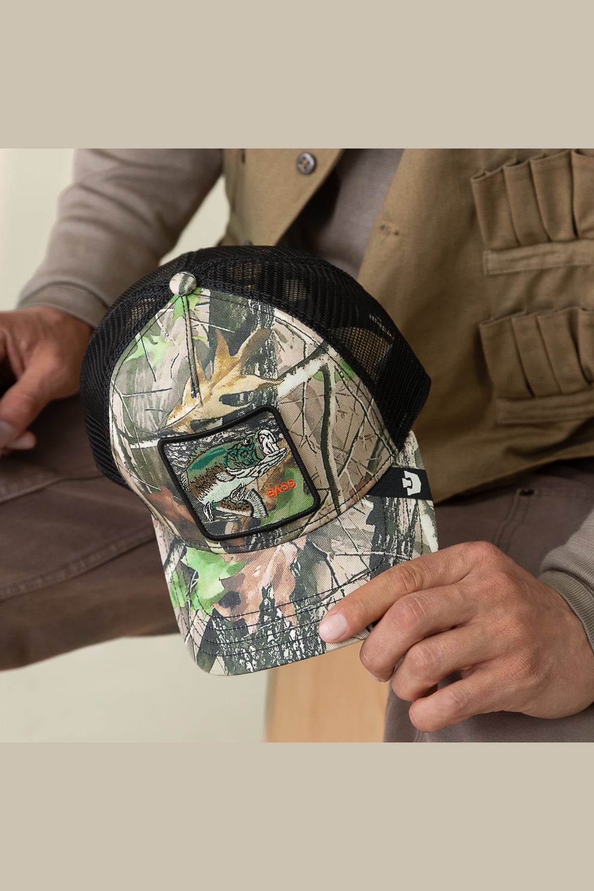 Goorin Bros Camouflage Bass trucker hat in woodland camo with embroidered bass patch