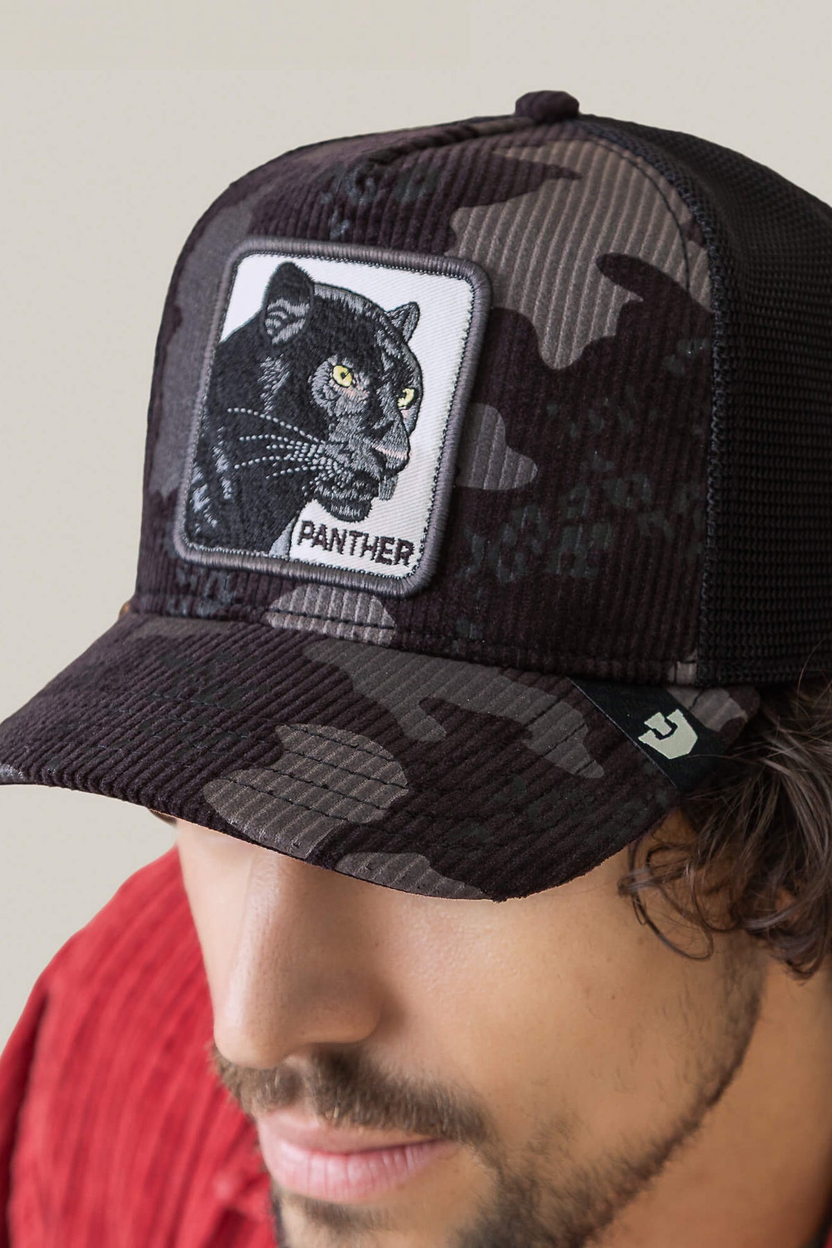 Goorin Bros Panther Camo trucker hat in Cola Corduroy with panther patch