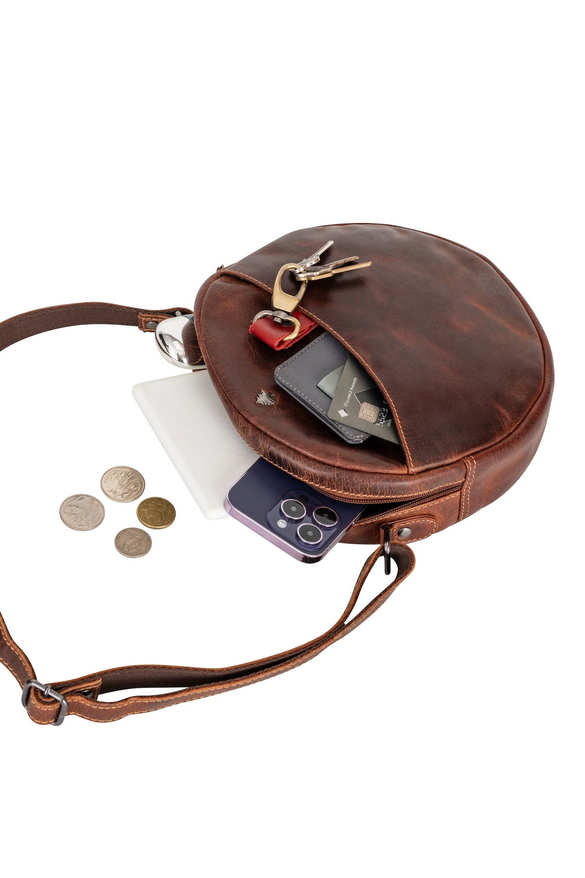 Greenwood Leather Sandy shoulder bag in Sandal — open interior holding essentials