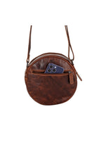 Greenwood Leather Sandy shoulder bag in Sandal — front pocket holding a phone