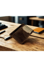 Greenwood Leather Slim Card Case in Sandal — on a desk with cards