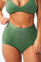 Huha Brief underwear in Thyme green, high-rise full-coverage underwear on a model