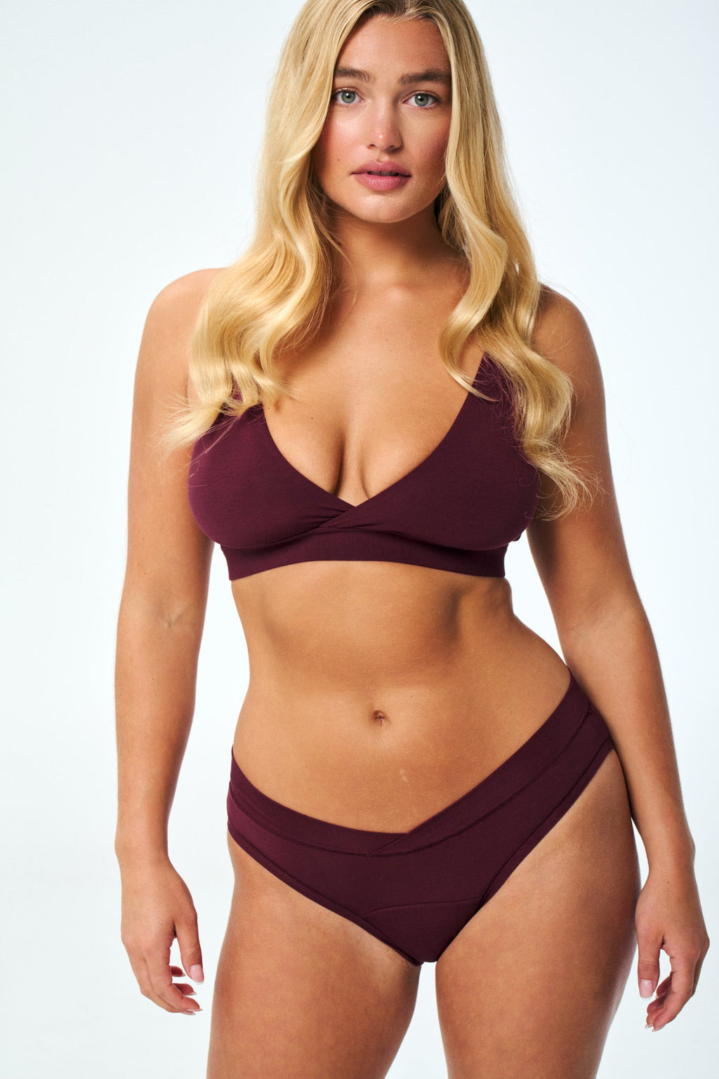 Huha Crossover Bikini underwear in Merlot burgundy, mid-rise V-waist underwear on a model
