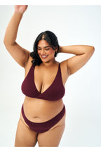 Huha Low Profile Thong underwear in Merlot burgundy, front view on a model