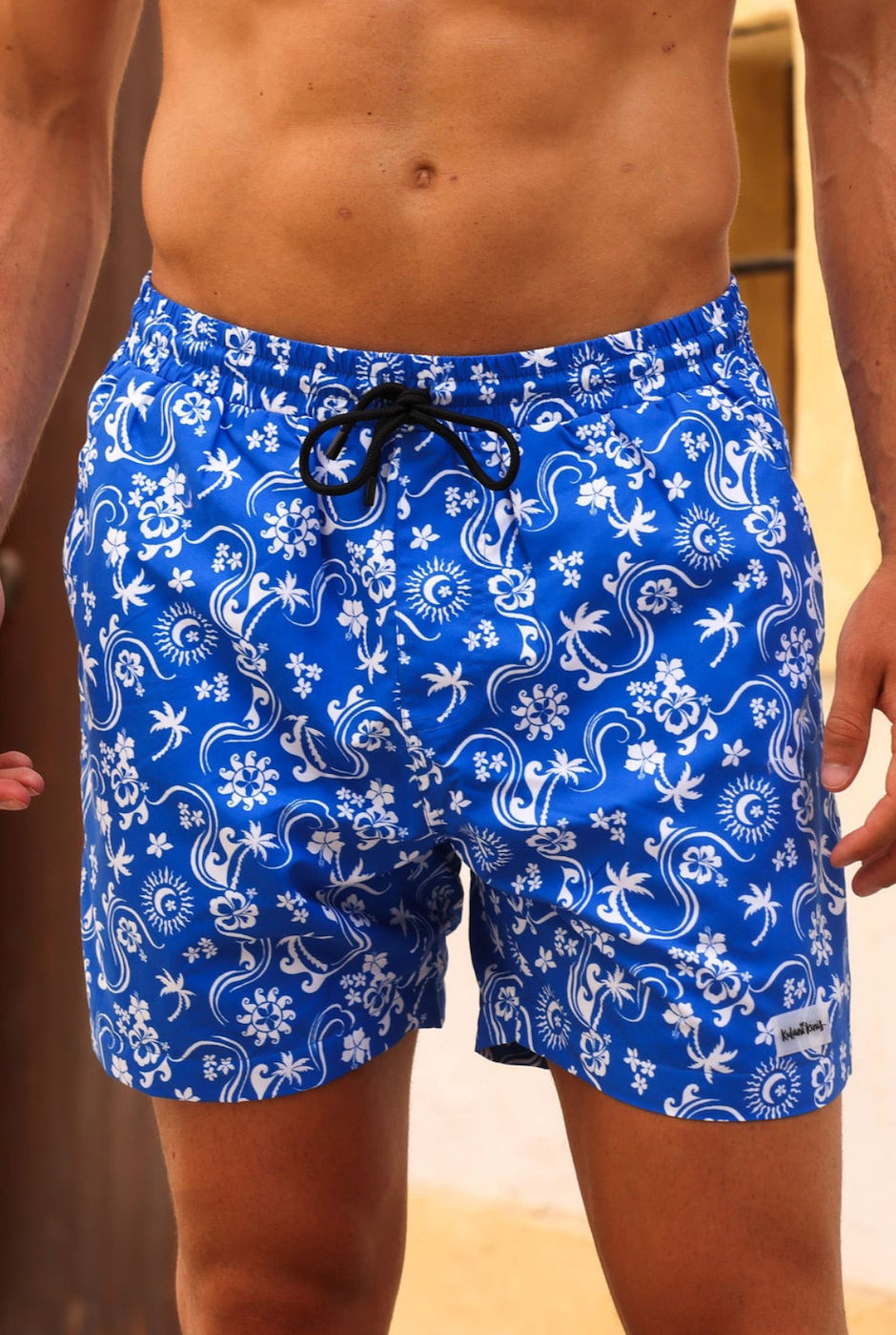 Close-up detail of the pattern, elastic waistband, and drawstring on Kulani Kinis Surfside trunks