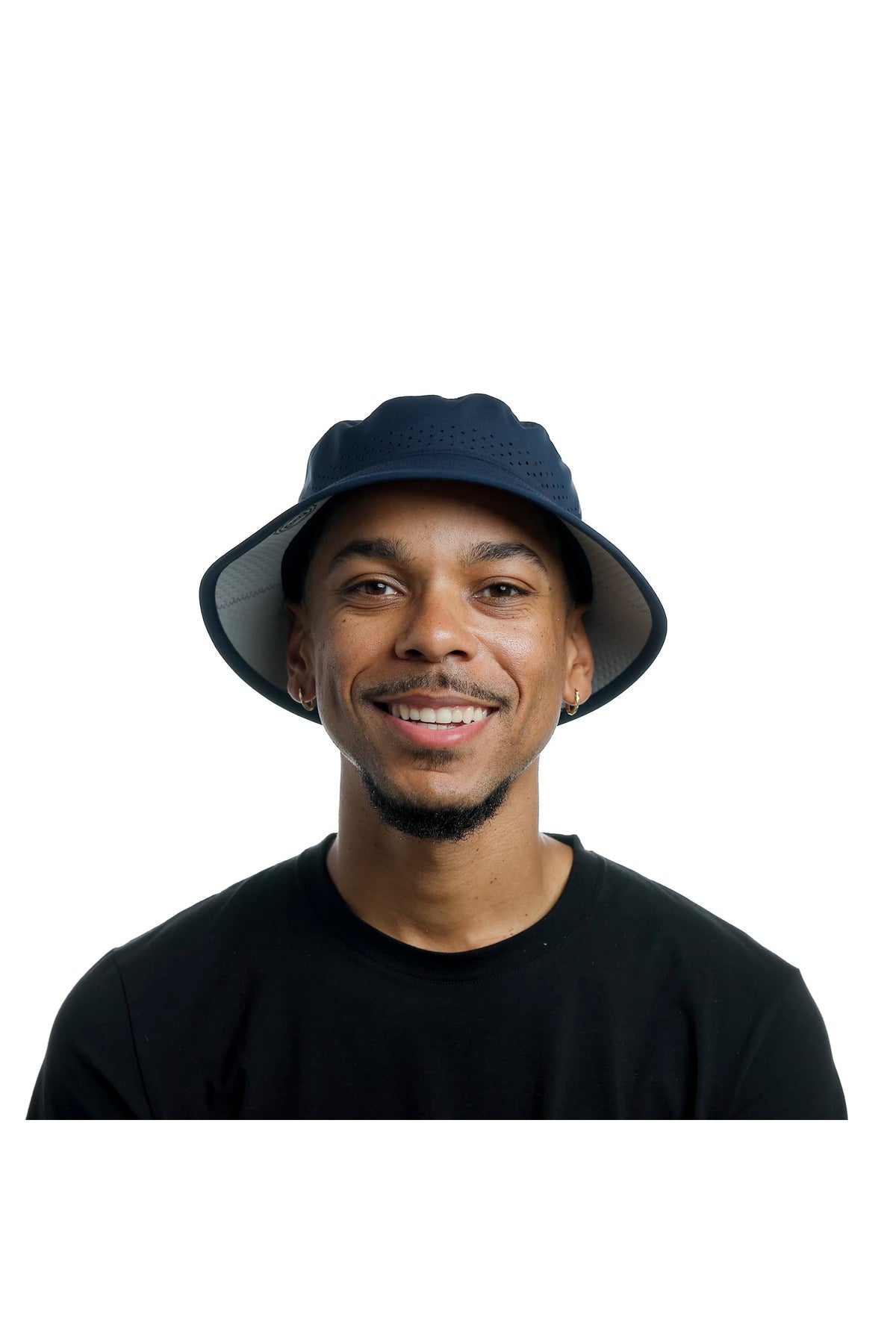 Model wearing the melin Caddy Hydro performance bucket hat in Navy