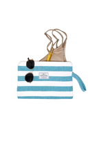 Tofino Towel Mira Wet-Dry Bag in Aqua with items in it for size reference