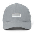 TravisMathew Limitless Hat women's golf cap in Heather Light Grey with rubber logo patch